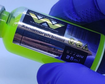 May include: A small, clear glass bottle filled with a bright green liquid. The bottle has a silver label with the text "Weyland-Yutani Corp. "Building Better Worlds." Xenomorph blood Sample 00684 Specimen Number Six Research Planer: BG-386 9775iu 25ml".