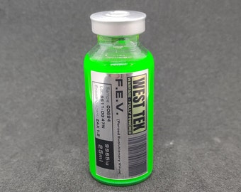 May include: A small, clear glass bottle with a silver cap filled with a bright green liquid. The bottle has a silver label with the text "WEST TEK WARFARE - FULLY POWERED F.E.V. [Forced Evolutionary Virus] Sample: 00684 Lot: 9611-0G 47N Encoding Agent: ZAX 1.2 9965iu 25ml".