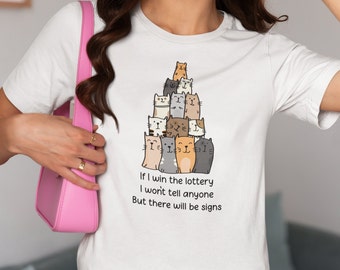 Lottery Winner Cats Tee: Silent Riches & Feline Clues! Unisex, Various Colors/Sizes. Funny Gift Shirt for Cat Lovers.