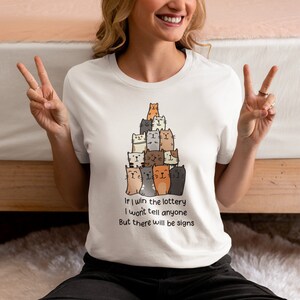 Lottery Winner Cats Tee: Silent Riches & Feline Clues Unisex, Various Colors/Sizes. Funny Gift Shirt for Cat Lovers. White