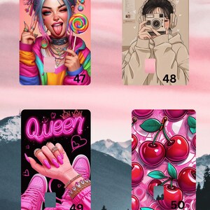 May include: Four colorful illustrations on a pink background. The first shows a woman with blue hair holding a lollipop. The second depicts a person taking a photo. The third shows the word "Queen". The fourth shows cherries.