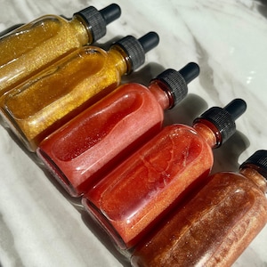 Wholesale Shimmering Body Oil, Turmeric Oil, massage oil, wholesale massage oil, homemade body oil, best body oil, glowing skin body oil