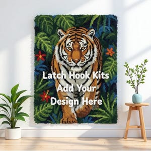 May include: A latch hook kit with a tiger design. The image shows a detailed depiction of a tiger with orange and black stripes, set against a backdrop of green foliage and red flowers. The text "Latch Hook Kits Add Your Design Here" is displayed.
