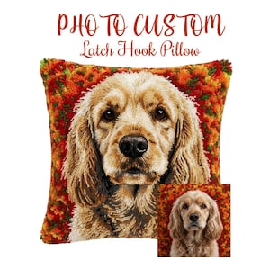 May include: A custom latch hook pillow featuring a detailed portrait of a Cocker Spaniel dog. The pillow has a textured, colorful background with the text "PHOTO TO CUSTOM Latch Hook Pillow" in red script.