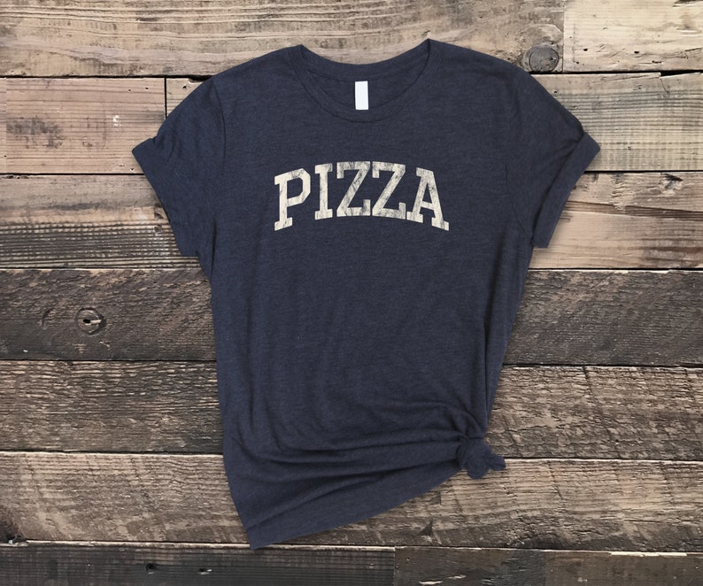 PIZZA, Distressed Funny T-Shirt, Super Soft Bella Canvas Unisex Short Sleeve T-Shirt, Varsity Shirt, Great Gift Idea For Pizza Lovers Heather Midnight Nav