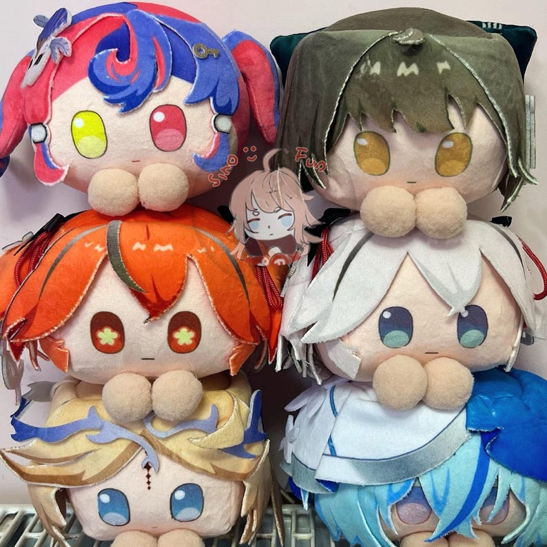 May include: A stack of plush dolls with large, expressive eyes and colorful hair. The dolls have round faces, with details like pom-pom noses and decorative accents. The color palette includes pink, blue, orange, green, and white.