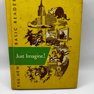 May include: A yellow book with a green spine titled "Just Imagine!"  The book is part of the "The New Basic Readers" series. The cover features a colourful illustration of a city skyline, a witch flying on a broomstick, a monkey, a train, and other whimsical images.