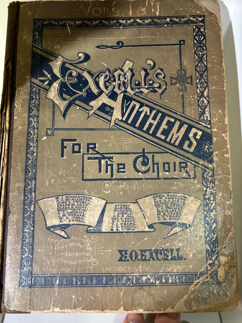 May include: A vintage book cover with a gold background and blue lettering. The title is "Excel's Anthems For The Choir". The cover lists contributors and the price as "900 Per Doz Each By Mail".