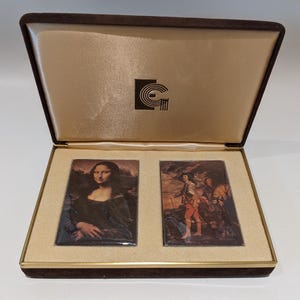 Vintage anni '70 Graphica Quebec Carte da gioco Famoso dipinto artistico Mona Lisa Scatola di velluto Nuovo vecchio stock Sigillato Ponte Giochi di carte Casa Cottage