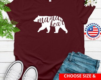 May include: Burgundy t-shirt with a white silhouette of a bear with the text "mama bear" inside the bear.