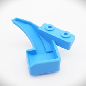 May include: A light blue plastic 3D printed object with a curved section and a flat section with two holes.