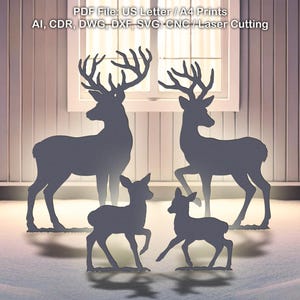 May include: Silhouette cutouts of deer in various sizes, including two adults and two fawns, are displayed against a winter scene. The image includes the text "PDF File: US Letter / A4 Prints" and file type information. The deer are a dark gray color.