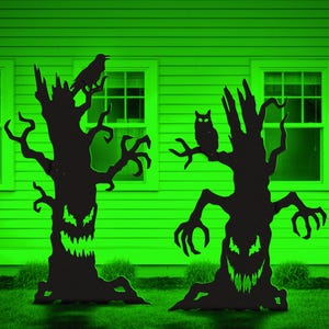 May include: Two black silhouette tree cutouts with jagged, glowing green faces and sharp branches. One tree features a perched crow, while the other has an owl. Text at the top reads: PDF File: US Letter / A4 Prints, AI, CDR, DWG, DXF, SVG: CNC / Laser Cutting, LUCKY LARK Vector Art.