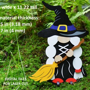 May include: A witch gnome with a black hat, white hair, and a black dress holding a broom. The gnome is 8.22 inches wide and 11.22 inches tall. Digital files for laser cutting.