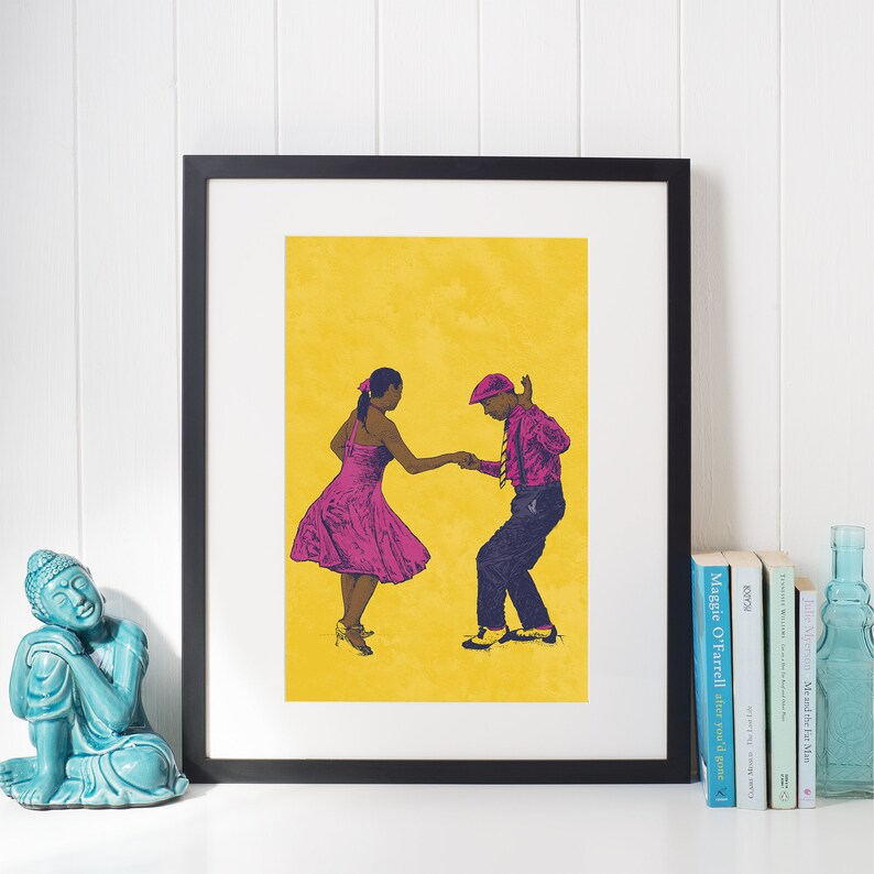 May include: A framed print of a couple dancing on a yellow background. The woman is wearing a pink dress and the man is wearing a pink shirt and blue pants.