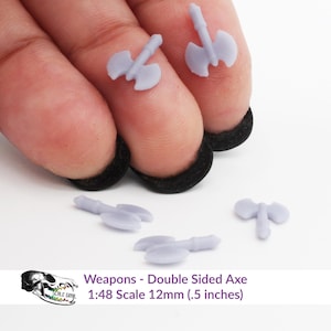 May include: Five miniature double-sided axes made of gray plastic. The axes are 12mm (0.5 inches) long and are designed for 1:48 scale models.  Weapons - Double Sided Axe 1:48 Scale 12mm (.5 inches)
