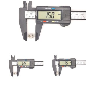 May include: A black digital caliper measuring a small white object. The caliper reads 15.0 mm, 13.4 mm, and 7.5 mm.