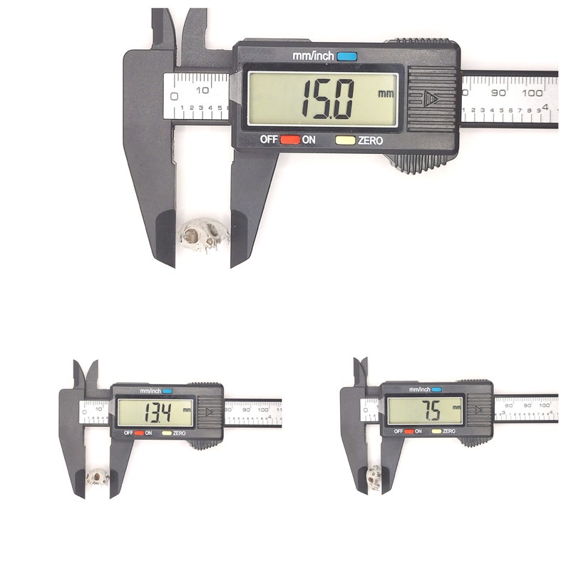 May include: A black digital caliper measuring a small white object. The caliper reads 15.0 mm, 13.4 mm, and 7.5 mm.