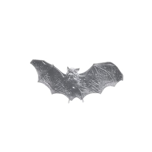May include: A detailed, silver-colored bat figurine with outstretched wings. The bat's wings display intricate vein detailing, and the body has a textured appearance. The figurine is set against a plain white background, highlighting its form.