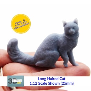 May include: A gray, long-haired cat figurine, approximately 1 inch (25mm) in length, in a seated position. The image includes text indicating various size options, including up to 6 inches. The product is labeled as 1:12 scale.