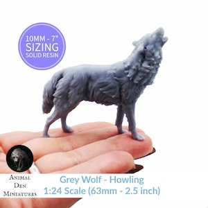 May include: A gray solid resin miniature of a howling wolf. The figurine is 2.5 inches (63mm) tall and is part of the Animal Den Miniatures collection. The text on the image reads "Grey Wolf - Howling 1:24 Scale".