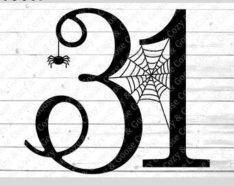 May include: Black and white silhouette of the numbers 31 with a spider and spider web. The numbers are stylized with a decorative font.