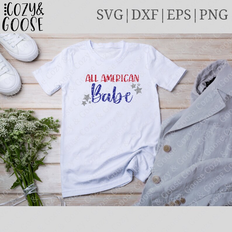 May include: White t-shirt with the text "All American Babe" in red, white, and blue lettering with silver glitter stars.