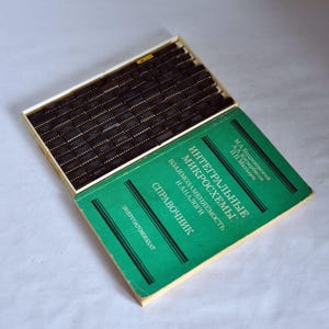 Vintage Recycled Electronic Microchips & Soviet Reference Book – Rare Collector's Set (104 Chips + 1991 Handbook)