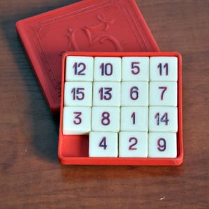 Vintage plastic logic game 15 slide puzzle, the 1980s