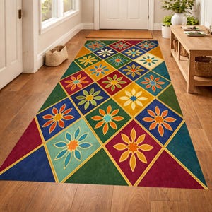 Op de afbeelding: Een kleurrijk bloemenpatroon tapijt met een geometrisch ontwerp. Het tapijt heeft een herhalend patroon van vierkante en ruitvormige vormen in verschillende kleuren, waaronder blauw, groen, geel en rood. Het bloemmotief voegt een decoratief tintje toe.