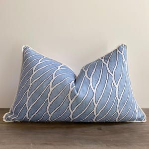 May include: A set of three ceramic mugs with a speckled, matte finish. The mugs are in shades of cream, light gray, and dark gray. Each mug has a simple, minimalist design, perfect for coffee or tea.