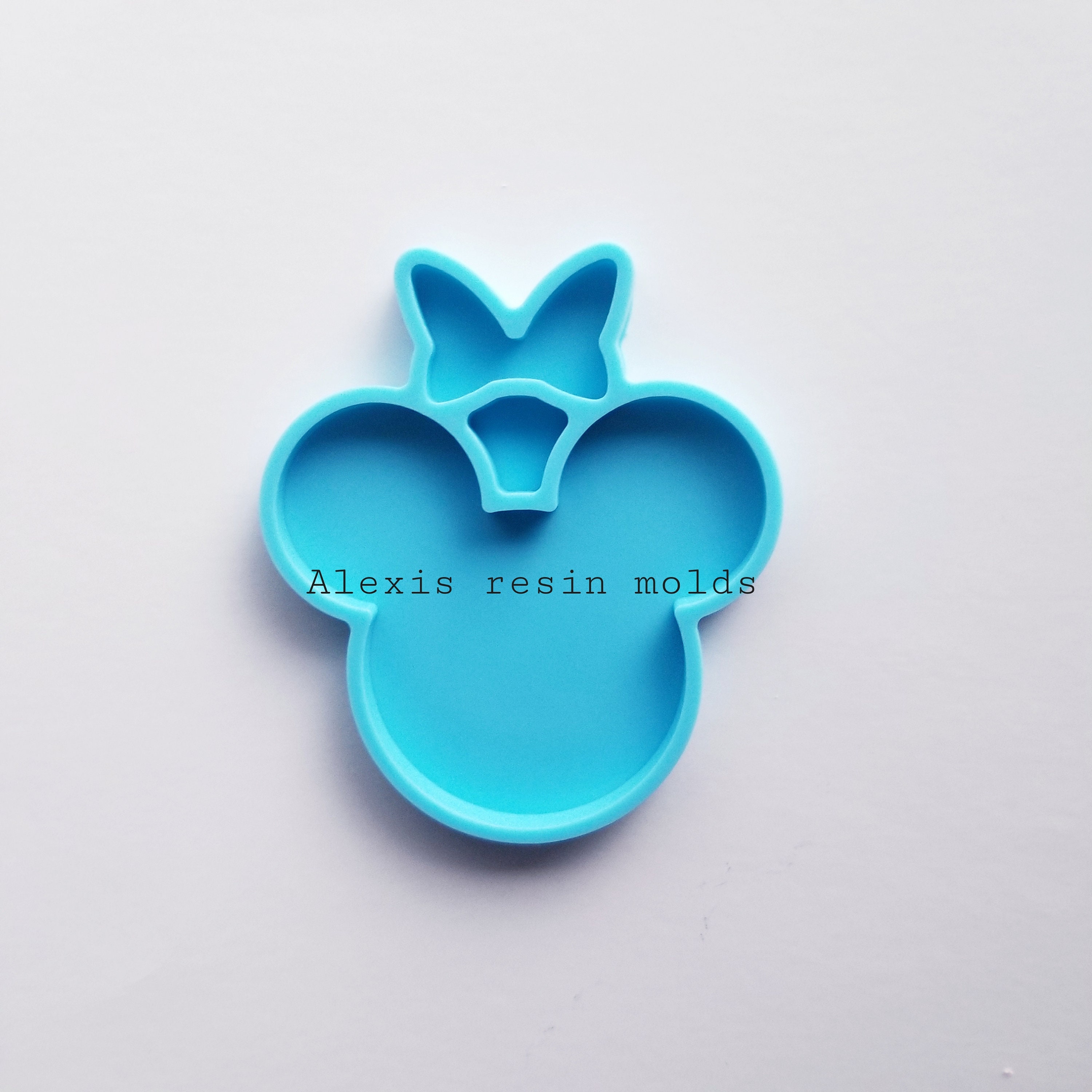 Mouse with bow phone grip mold