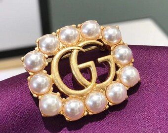 gucci pearl brooch