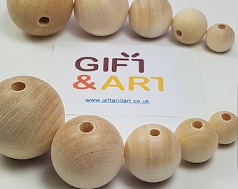 Bolas de madera natural lisas sin terminar con agujeros de 10, 12, 16, 20, 25, 30, 35, 40 y 50 mm de madera de haya y abedul.