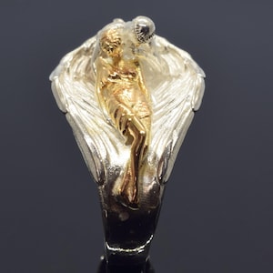 Anillo Abrazo de Ángel de Plata: Un descanso angelical en elegante plata de ley.