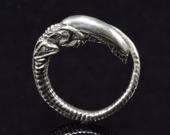 Handcrafted Silver Alien Newborn Ring - Unique Sci-Fi Collector's Jewelry - Artistic Design for Pop Culture Enthusiasts