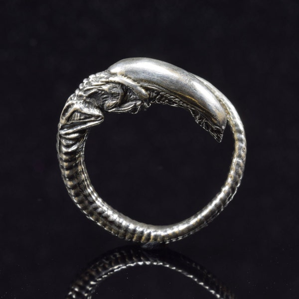 Handcrafted Silver Alien Newborn Ring - Unique Sci-Fi Collector's Jewelry - Artistic Design for Pop Culture Enthusiasts