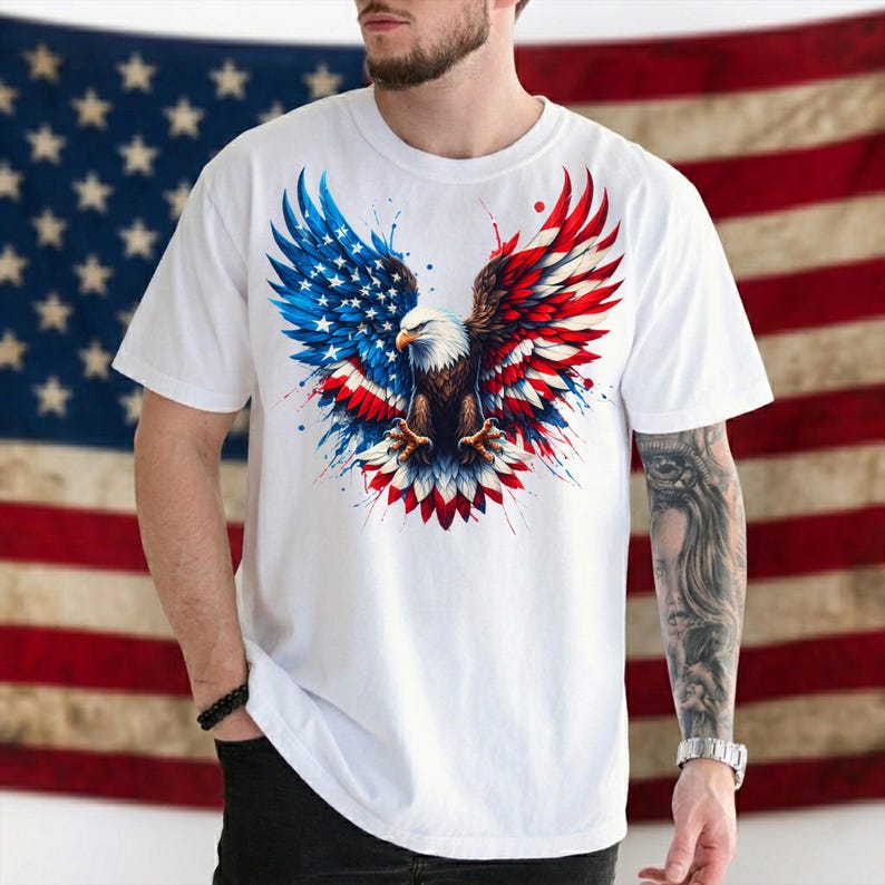 A man wearing a white t-shirt with an American flag design and an eagle graphic.