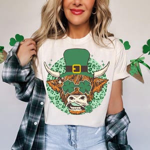 Highland Cow St Patrick&#39;s Day Shirt, Shamrock Heifer T-Shirt, Irish Cow Sweatshirt, St Paddy’s Day Green Bow Shirt, Lucky Highland Cow Tees