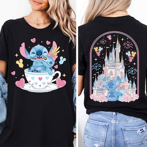 The image is a collage of two photos. In the first photo, a woman is wearing a black t-shirt with a graphic design featuring a blue character, a castle, and hearts. In the second photo, the woman is wearing a black t-shirt with a graphic design featuring a blue character, a castle, and hearts.
