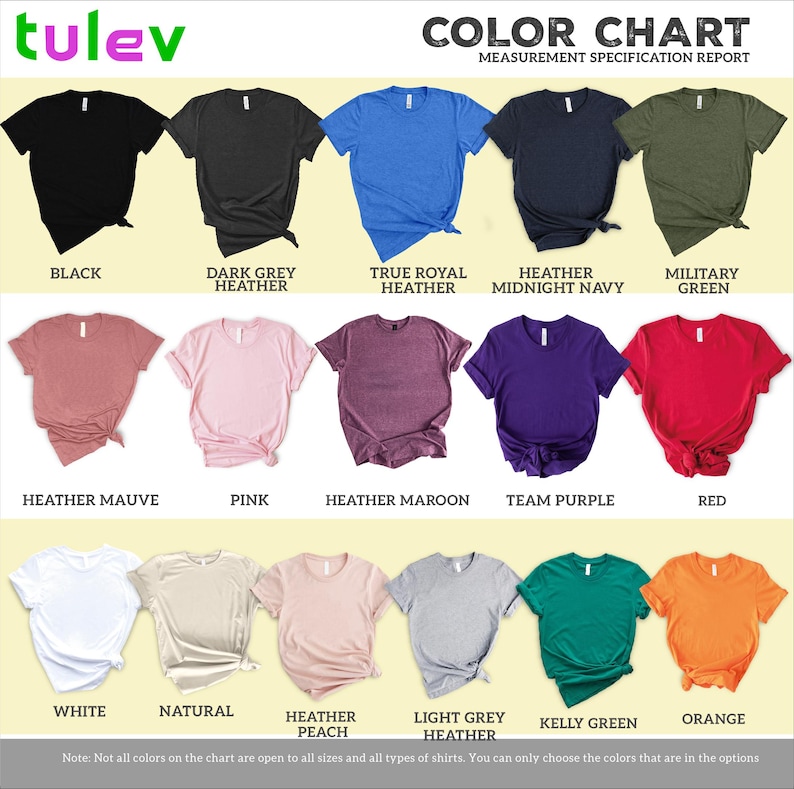 The image is a color chart that displays various t-shirt colors and their corresponding names. The chart includes a collection of t-shirts in different colors, such as black, dark grey, true royal heather, heather maroon, team purple, pink, peach, light grey, kerry green, and orange. The chart provides a visual representation of the different color options available for t-shirt designs.