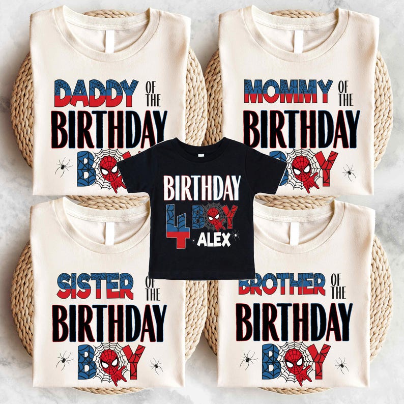 a collection of birthday t-shirts with the text "DADDY OF THE BIRTHDAY" and "MOMMY OF THE BIRTHDAY" printed on them, along with Spider-Man and Spider-Man logos. The t-shirts are arranged in a row, with one black t-shirt in the center featuring the text "BIRTHDAY ALEX".