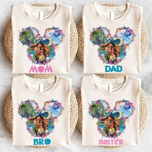a group of three shirts with a picture of a woman and a man on them