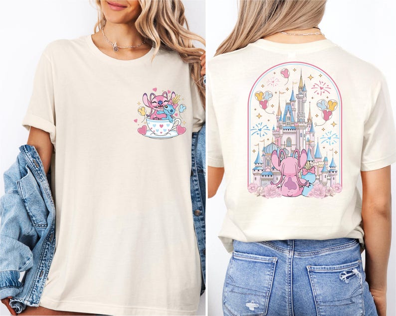 A woman wearing a white t-shirt with a graphic design of a castle and two pink characters on the back.
