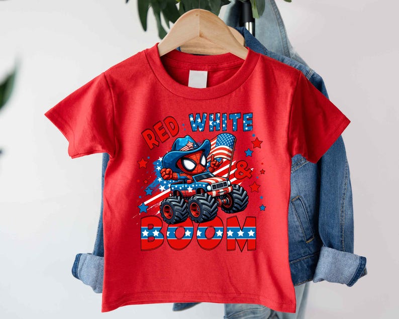 A red t-shirt with a graphic design featuring a Spider-Man character and patriotic symbols, such as an American flag and stars, along with the text "RED WHITE BOOM".