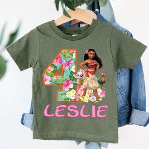 a green shirt with the number four on it