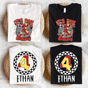 four birthday t-shirts, each with a unique design and a different number. The t-shirts are arranged on a white surface, with a woven basket placed underneath each one.
