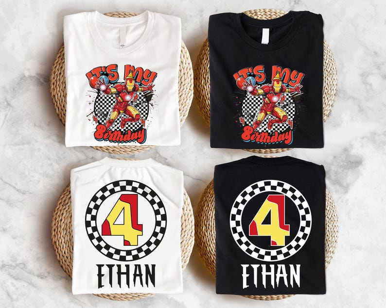 four birthday t-shirts, each with a unique design and a different number. The t-shirts are arranged on a white surface, with a woven basket placed underneath each one.