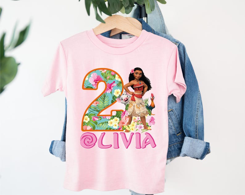 a pink shirt with a picture of a woman on it