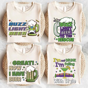 four white t-shirts with colorful and humorous text and graphics printed on them.